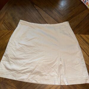 Nike Golf Dri-Fit cream colored skirt with shorts, adjustable zipper and pockets
